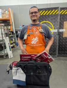 Home Depot Liverpool's Ken B with tool bag prize